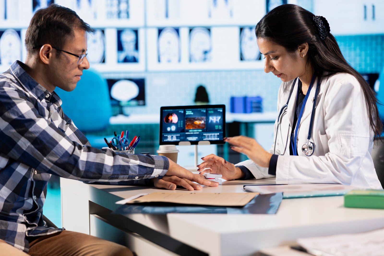 healthcare professional uses an oximeter to measure the oxygen levels